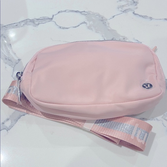 lululemon athletica Handbags - Lululemon Everywhere belt bag pink/ silver